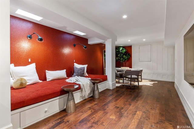 living area featuring dark wood-type flooring