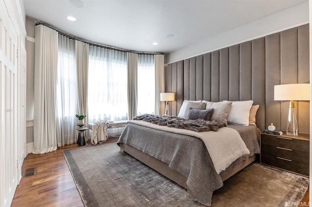 bedroom featuring dark wood-type flooring