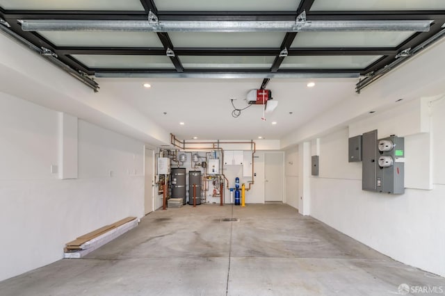 garage featuring a garage door opener, electric panel, and water heater