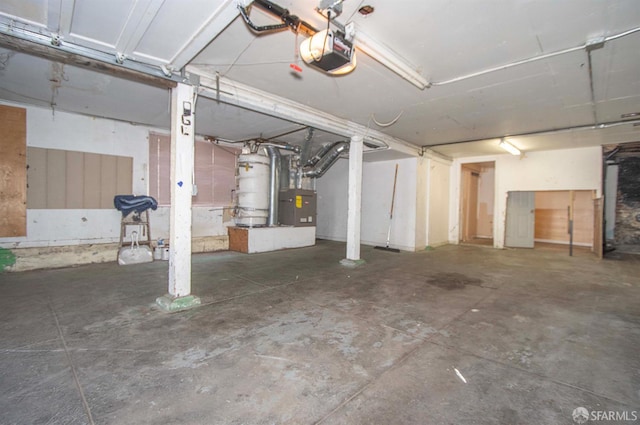 2567 Bryant St, San Francisco, CA 94110 - garage featuring a garage door opener, secured water heater, and heating unit