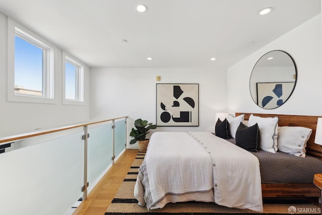 bedroom featuring recessed lighting and light wood-type flooring