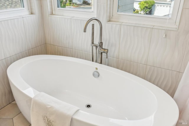 110 Baypoint Dr, San Rafael, CA 94901 - full bath featuring a freestanding tub, a sink, and tile patterned floors