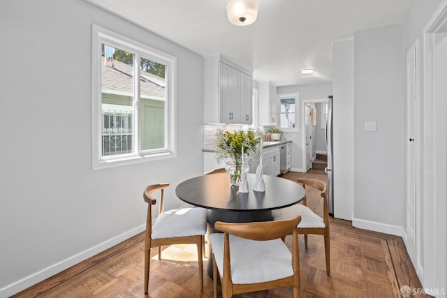 939 Innes Ave, San Francisco, CA 94124 - dining room featuring baseboards