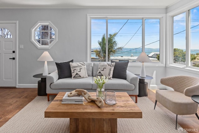 939 Innes Ave, San Francisco, CA 94124 - living room featuring baseboards and crown molding