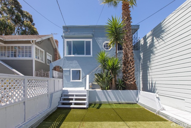 939 Innes Ave, San Francisco, CA 94124 - back of house featuring stucco siding