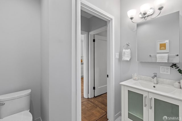 939 Innes Ave, San Francisco, CA 94124 - half bathroom featuring vanity and a chandelier