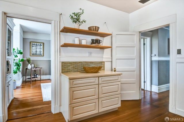 kitchen with dark hardwood / wood-style flooring