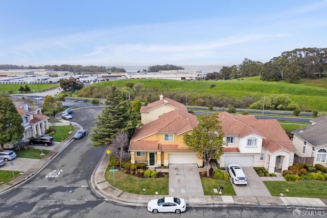 birds eye view of property with a residential view