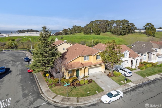 birds eye view of property with a residential view