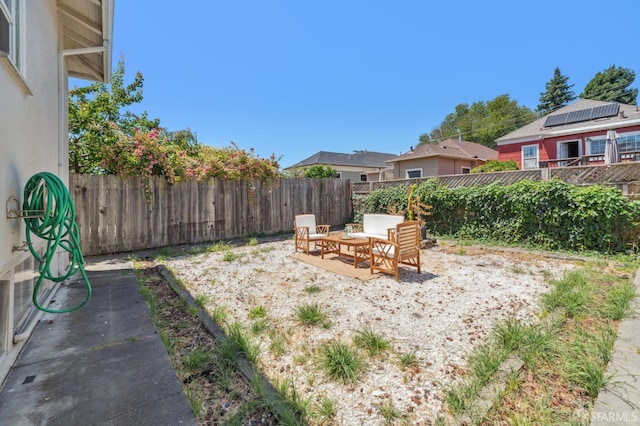 882 56th St, Oakland, CA 94608 - fenced backyard with a patio and outdoor lounge area