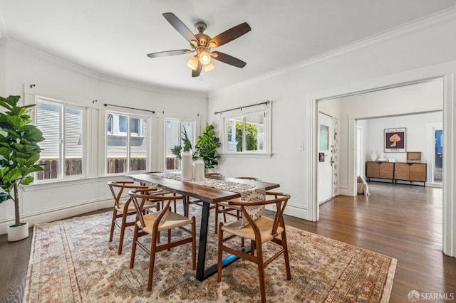 882 56th St, Oakland, CA 94608 - dining room with ceiling fan, dark wood-style floors, and ornamental molding