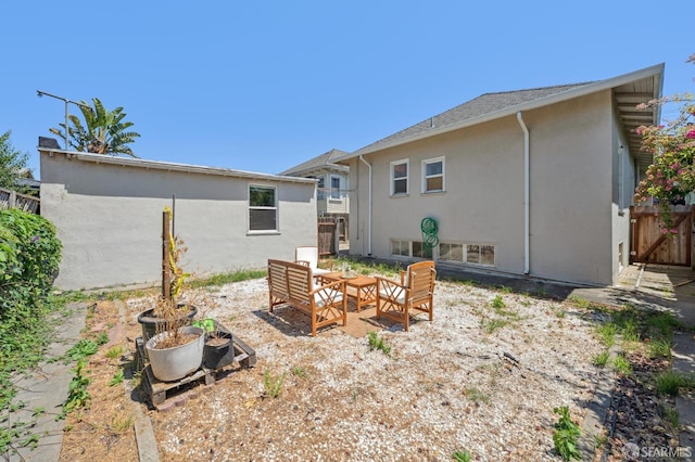 882 56th St, Oakland, CA 94608 - back of property featuring stucco siding