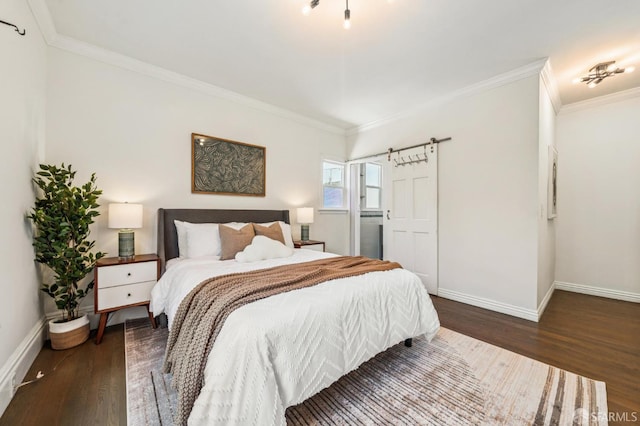 882 56th St, Oakland, CA 94608 - bedroom with wood finished floors, a barn door, and ornamental molding