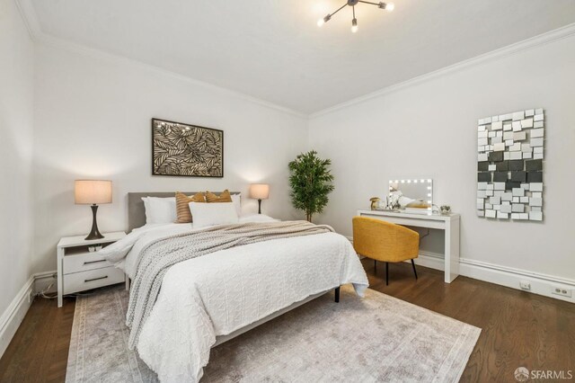 882 56th St, Oakland, CA 94608 - bedroom featuring crown molding and wood finished floors