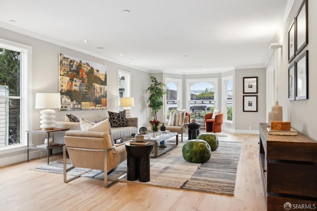 interior space with ornamental molding and light wood-type flooring