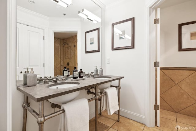 bathroom featuring tile patterned flooring and crown molding