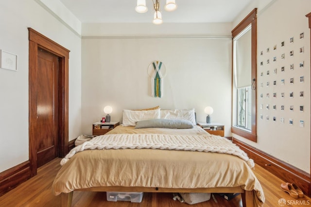 522 Liberty St, San Francisco, CA 94114 - bedroom featuring baseboards and wood finished floors