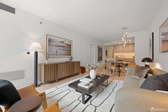 333 Beale St Unit 5I, San Francisco, CA 94105 - living area featuring baseboards