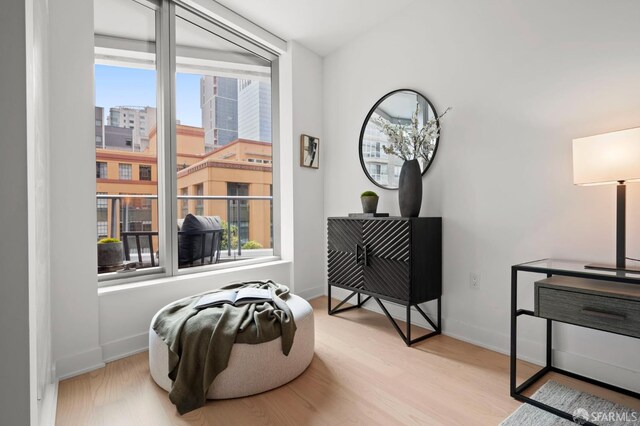 333 Beale St Unit 5I, San Francisco, CA 94105 - living area with healthy amount of natural light and wood finished floors