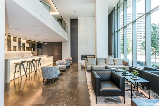333 Beale St Unit 5I, San Francisco, CA 94105 - building lobby featuring a high ceiling and floor to ceiling windows