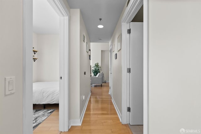 hallway featuring light hardwood / wood-style floors