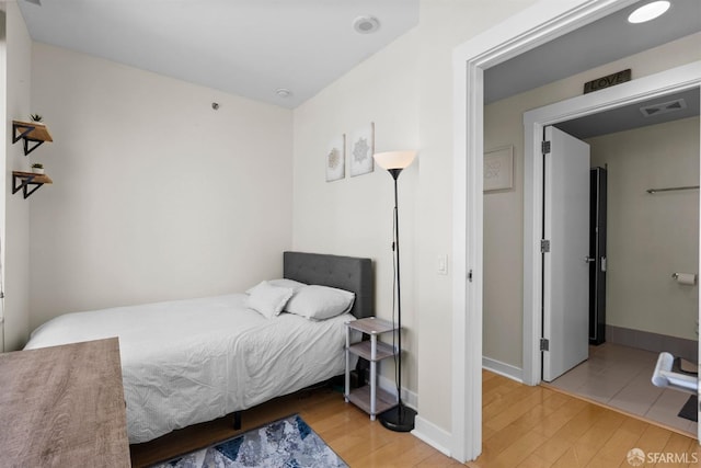 bedroom featuring light hardwood / wood-style floors