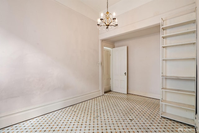 1075 Noe St, San Francisco, CA 94114 - spare room featuring baseboards and a notable chandelier