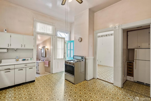 1075 Noe St, San Francisco, CA 94114 - kitchen featuring white cabinets, a towering ceiling, white appliances, and light countertops