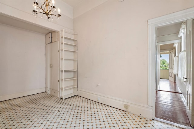 1075 Noe St, San Francisco, CA 94114 - spare room featuring baseboards and an inviting chandelier