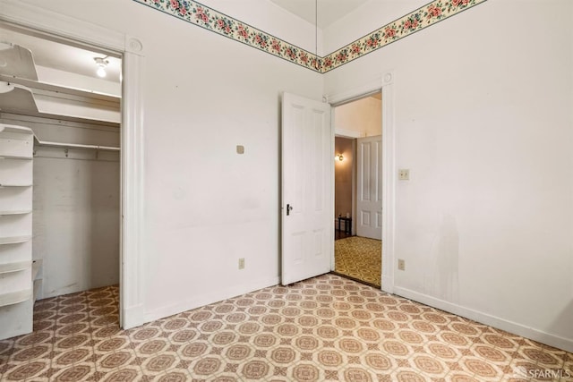 1075 Noe St, San Francisco, CA 94114 - unfurnished bedroom with baseboards, tile patterned floors, and a closet