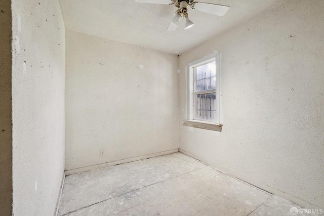 unfurnished room with a ceiling fan