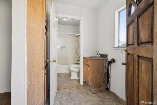 bathroom featuring shower / bathing tub combination, toilet, and vanity