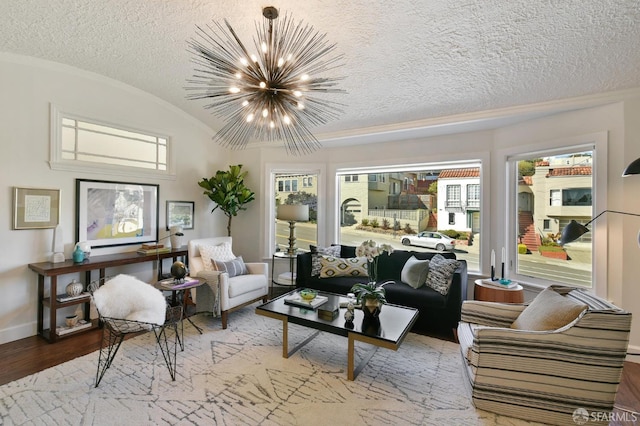 331 Vicente St, San Francisco, CA 94127 - living room featuring a chandelier, a textured ceiling, wood finished floors, and vaulted ceiling