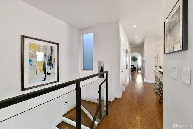 331 Vicente St, San Francisco, CA 94127 - hallway featuring an upstairs landing, wood finished floors, arched walkways, and recessed lighting