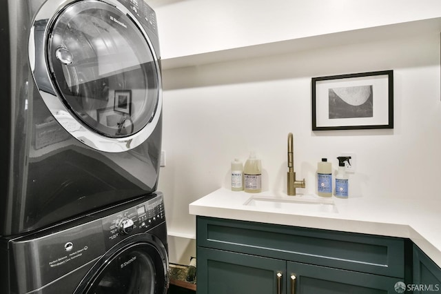 331 Vicente St, San Francisco, CA 94127 - laundry room with stacked washer and clothes dryer and cabinet space