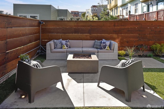 331 Vicente St, San Francisco, CA 94127 - fenced backyard featuring an outdoor living space with a fire pit and a patio