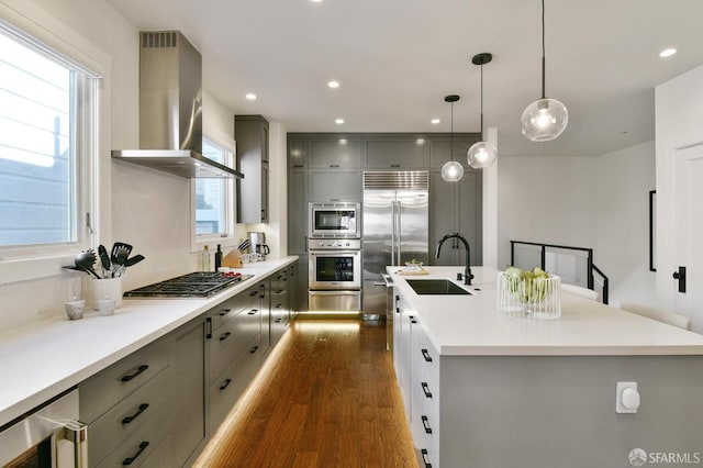 331 Vicente St, San Francisco, CA 94127 - kitchen featuring wall chimney exhaust hood, gray cabinetry, built in appliances, beverage cooler, and dark wood finished floors