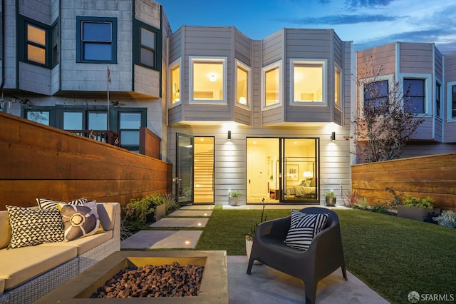 331 Vicente St, San Francisco, CA 94127 - back of property featuring an outdoor living space with a fire pit and a patio