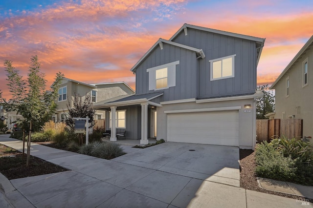 front of property with a garage