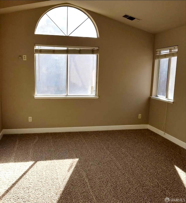 4400 Elk Dr, Antioch, CA 94531 - carpeted empty room with baseboards and vaulted ceiling