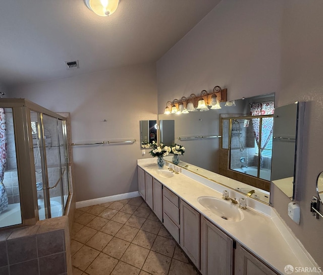 4400 Elk Dr, Antioch, CA 94531 - bathroom with double vanity, a shower stall, tile patterned floors, and baseboards