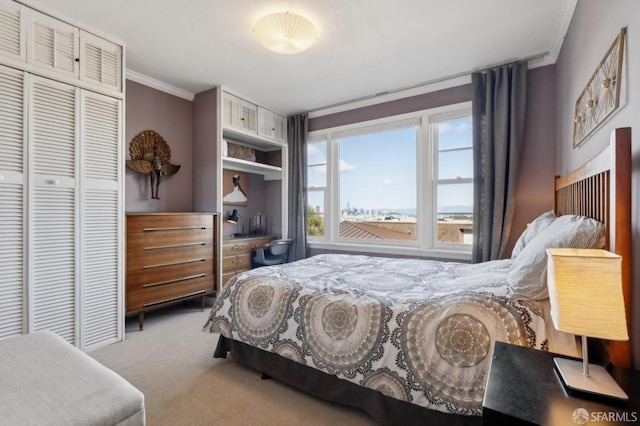 carpeted bedroom featuring crown molding