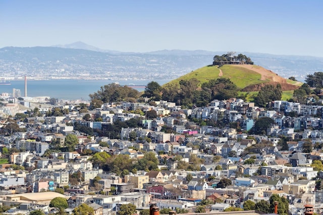 bird's eye view featuring a water and mountain view