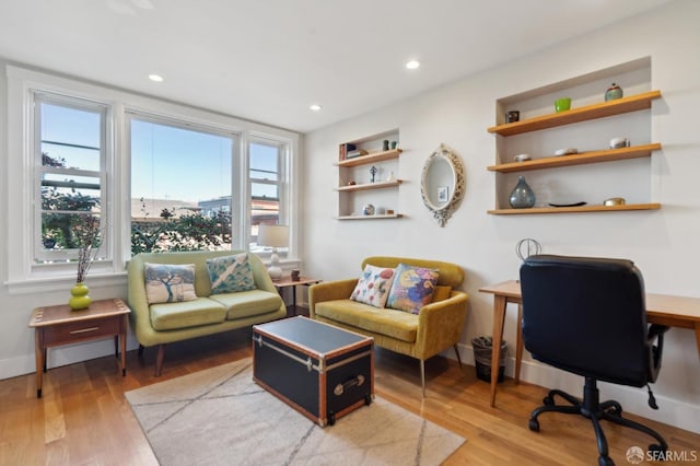 office area featuring recessed lighting, baseboards, and wood finished floors