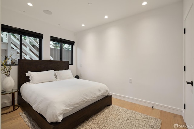 bedroom featuring light hardwood / wood-style floors