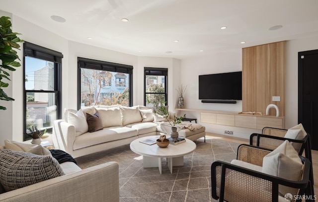 living room featuring a wealth of natural light