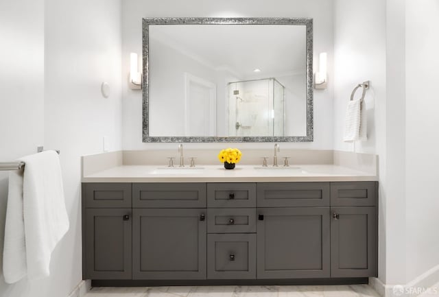 bathroom featuring an enclosed shower and vanity