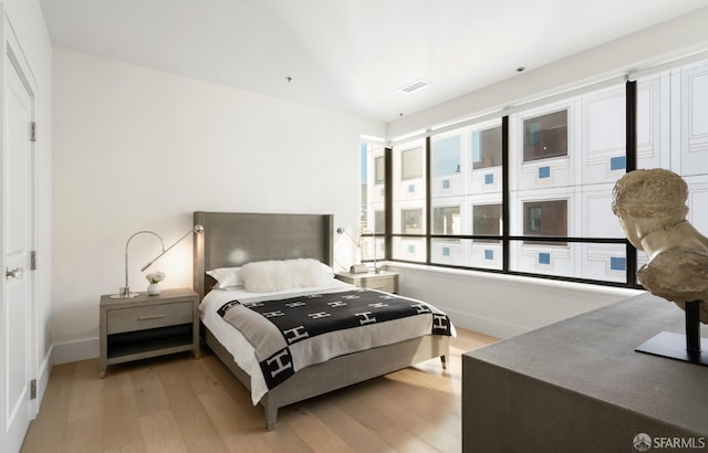 bedroom featuring light hardwood / wood-style floors