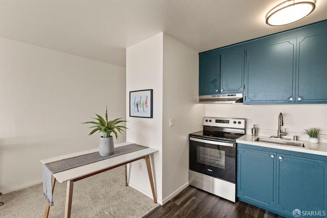 655 Corbett Ave Unit 505, San Francisco, CA 94114 - kitchen featuring electric stove, a sink, blue cabinets, under cabinet range hood, and light countertops