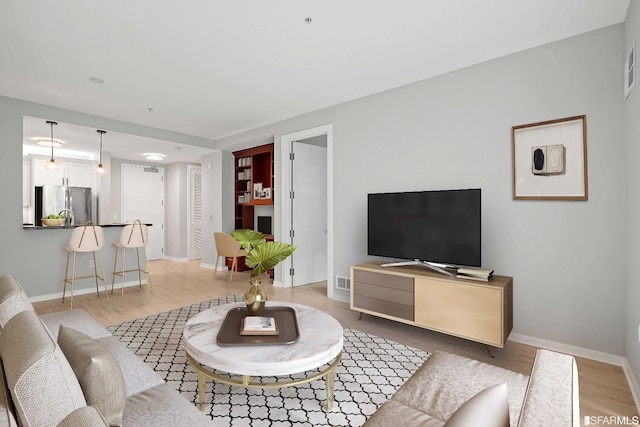 living room with light wood-type flooring